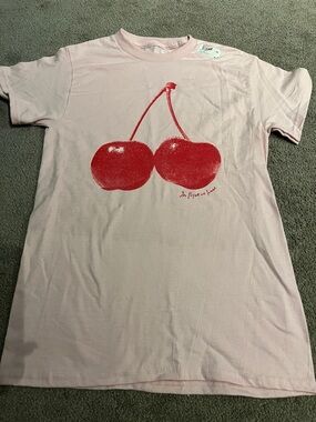 Women’s small in print we trust tee shirt with red cherry new with tags !!